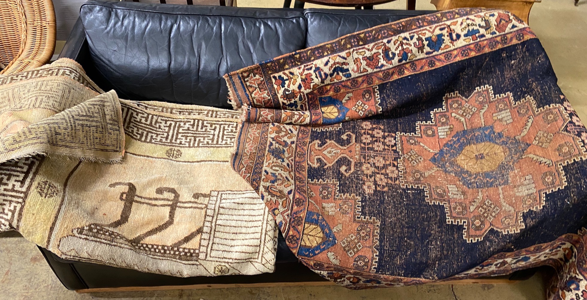 An antique Afshar rug, 190 x 34cm and a cream ground carpet with stylised Greek border